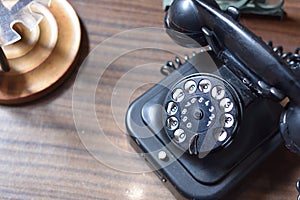 Vintage telephone with rotary disc dial
