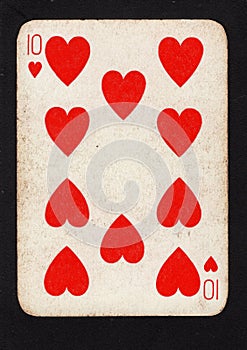 A vintage ten of hearts playing card on a black background.