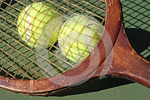 Vintage Tennis Racquet and Balls Closeup photo
