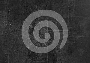 Vintage texture of black stone wall