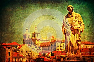 Vintage textured cityscape of Lisbon with old statue
