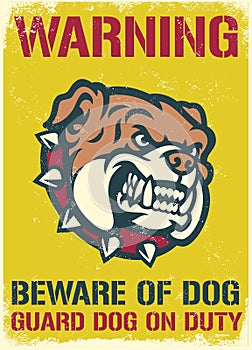 Vintage and textured warning sign of beware of the dog