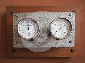 vintage thermometer and hygrometer