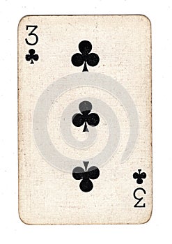 A vintage three of clubs playing card.