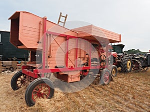 a vintage threshing machine seen at a display