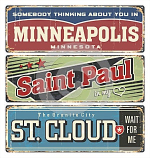 Vintage tin sign collection with USA cities. Minneapolis. Saint Paul. St. Cloud. Retro souvenirs.