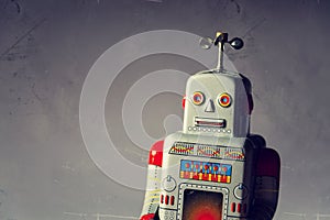 Vintage tin toy robot isolated, drone delivery artificial intelligence concept