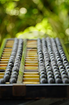 Old abacus and hold electronic calculator. picture financial concept design.