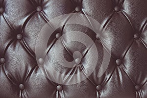 Vintage tone of leather texture with buttoned pattern
