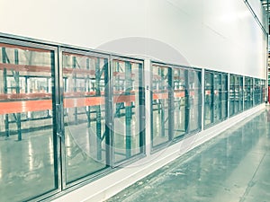 Vintage tone row of empty commercial fridges at wholesale big-box store