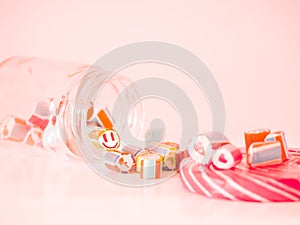 Vintage tone. You can see smiley face candy cane in glass jar