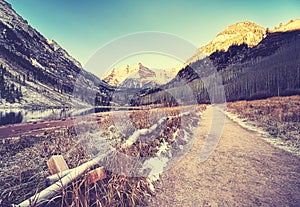 Vintage toned path to Maroon Bells at sunrise, Colorado, USA