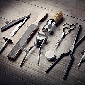 Vintage tools of a barber on wood desk