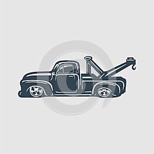 The vintage tow truck illustration logo