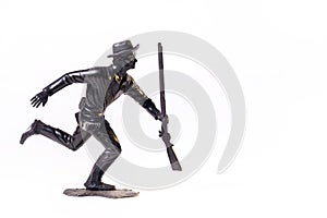 Vintage toy black soldier isolated on white background