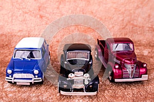 Vintage toy cars in an old background