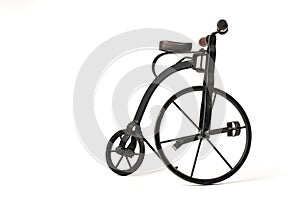 Vintage toy velocipede isolated in white photo