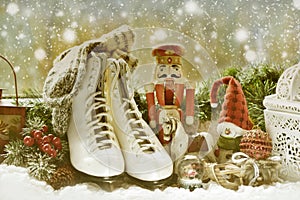 Vintage toys and old skates on window sill for christmas photo