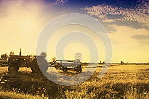 Vintage tractor in field