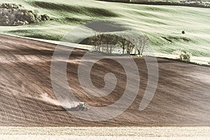 Vintage Tractor Handles Earth on Field