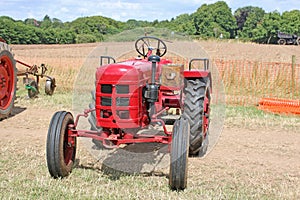 Vintage tractors in a field