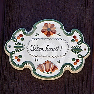 Vintage traditional ceramic door sign from transylvanian. Isten Hozott! `Welcome`
