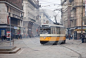 Vintage tram on the city street with motion blur