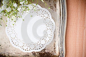 Vintage tray, white napkin and flowers