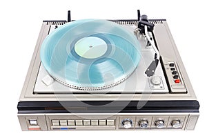 Vintage turntable record player with turquoise vinyl
