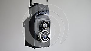 Vintage two lens photo camera isolated on white background photo