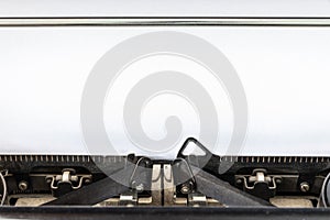 Vintage typewriter with blank sheet of paper retro technology