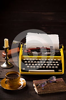 vintage typewriter and cup of coffee