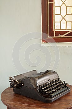 Vintage typewriter on an old desk