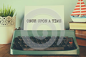 Vintage typewriter with phrase: ONCE UPON A TIME