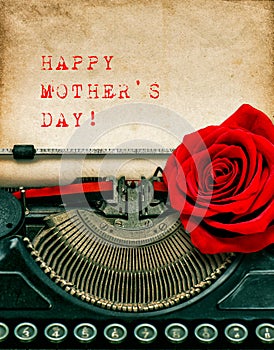 Vintage typewriter red rose flower. Happy Mothers Day