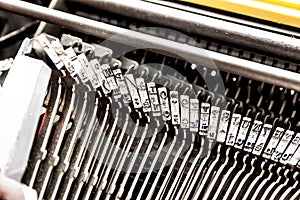 Vintage typewriter strikers set close up, macro shot photo