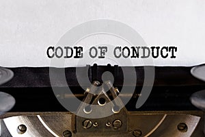 Vintage typewriter with typed text - CODE OF CONDUCT photo