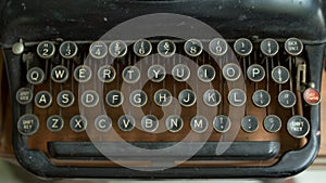 Vintage typewriter on wooden table