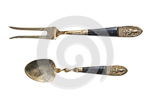 Vintage Unusual Antique Arabic Cutlery gold spoons, forks isolated on white background. Antique silverware.