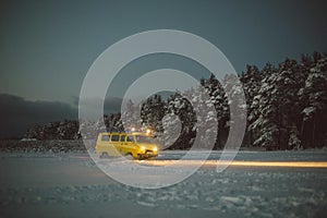 Vintage ussr yellow van winter snow forest