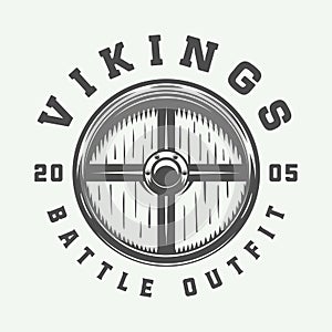 Vintage vikings motivational logo, label, emblem, badge