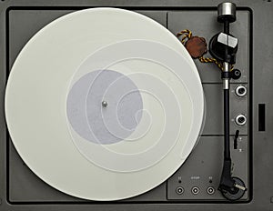 Vintage vinyl turntable with vinyl plate.