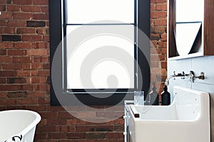 Vintage warehouse bathroom conversion with large blank window for text