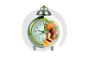 Vintage watch and healthy fruit platter, organic food and fruit and vegetable vitamins. The concept of nutrition, healthy food