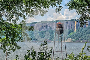 Vintage Water Tower on the Hudson River photo
