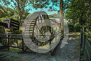 Vintage water wheel used to run Cornwalls old Tin Mines . Cornwall, England, UK