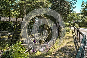 Vintage water wheel used to run Cornwalls old Tin Mines . Cornwall, England, UK