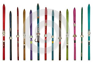 Vintage weathered colorful skis isolated on a white background
