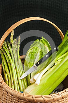 Vintage weaved reed basket of organic home grown vegetables