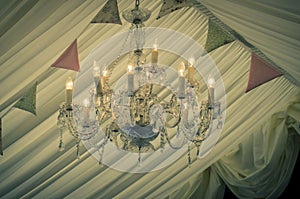 A vintage wedding chandelier and bunting